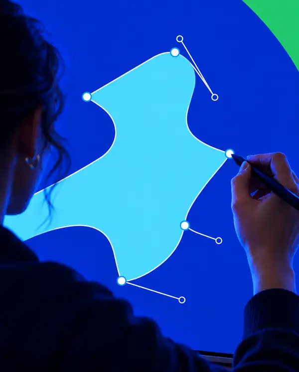 Bright cyan vector shape being edited against a deep blue canvas.